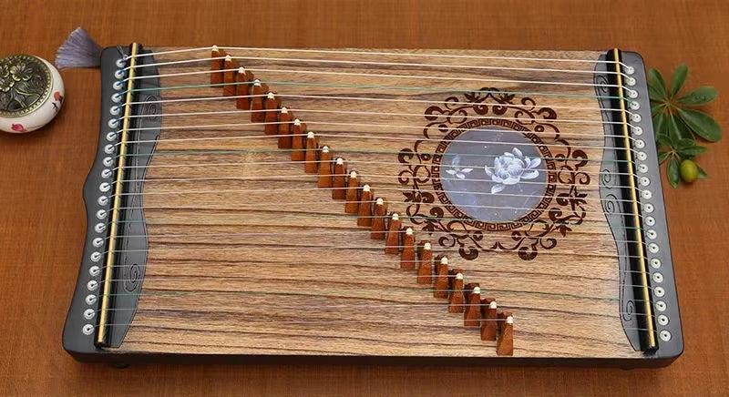 Wooden 60 cm Mini Guzheng Paulownia Zither with decorative design and 21 strings
