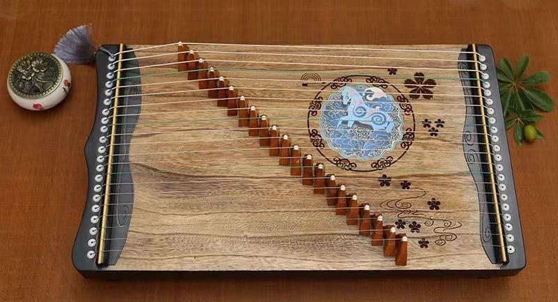 Wooden Guzheng with floral designs and circular sound hole in 60 cm Mini size