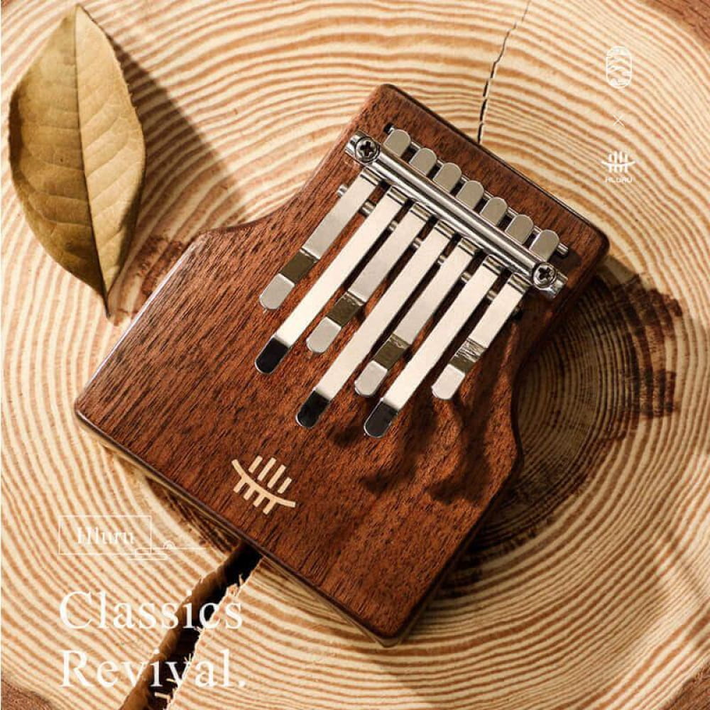Wooden Kalimba thumb piano with metal tines in Black Walnut, 7-Key Portable design