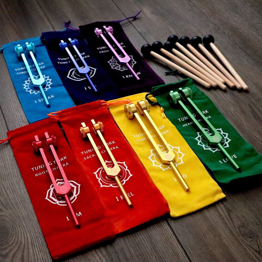 Colorful tuning fork pouches with matching forks and mallets from 7pc Chakra Tuning Fork Set