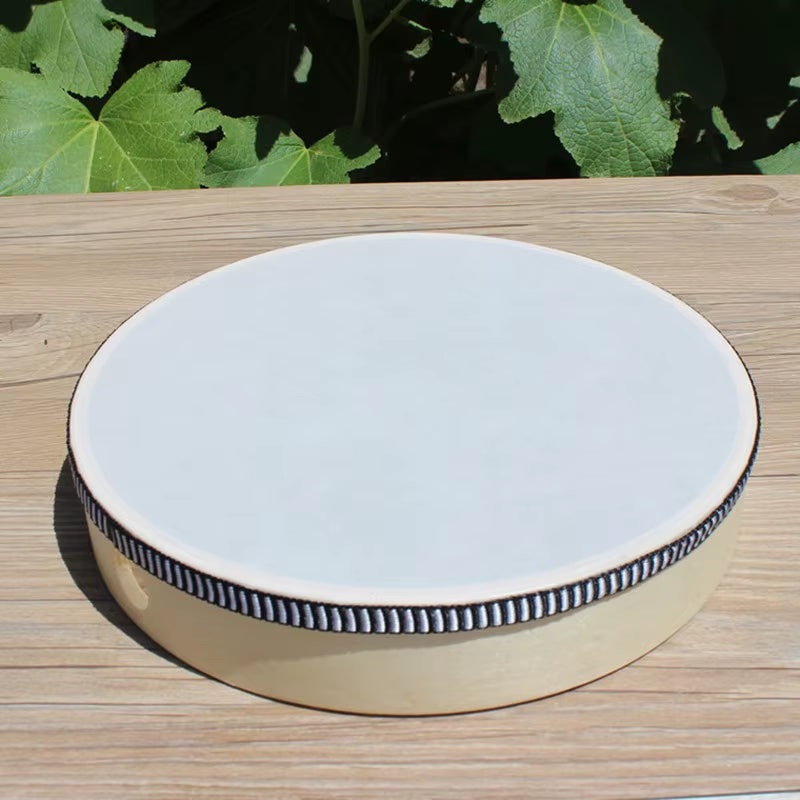 Round white ceramic plate with black and white striped border for kids music drum