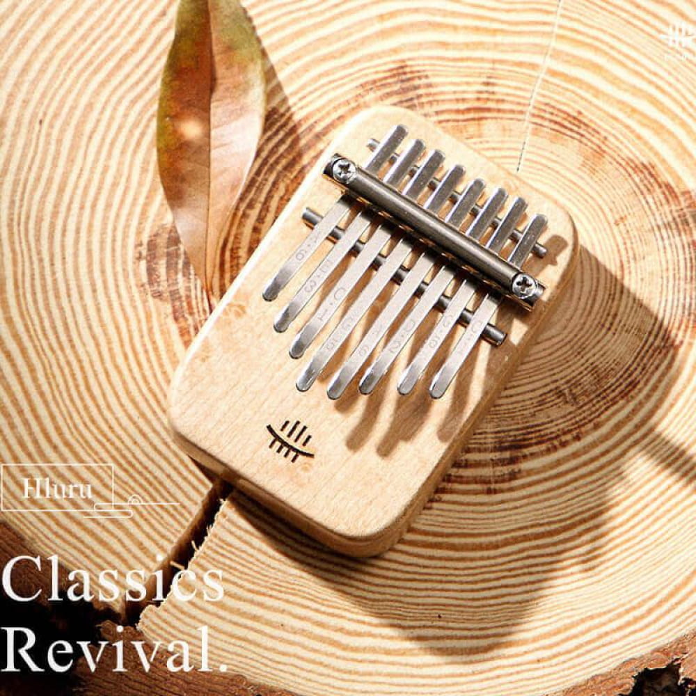 8 Key Maple C Tone Kalimba Thumb Piano featuring wooden body and metal tines