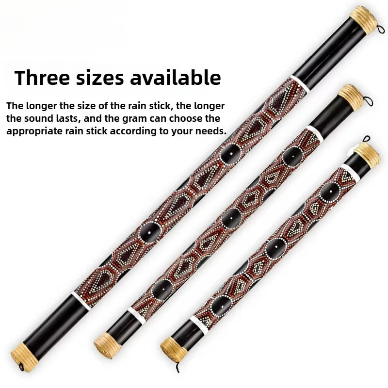 Bamboo Rainstick Instrument with tribal patterns in black and reddish-brown designs
