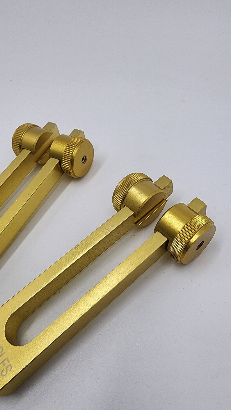Three brass tuning forks for cellulite therapy in Cellulite Tuning Fork Set