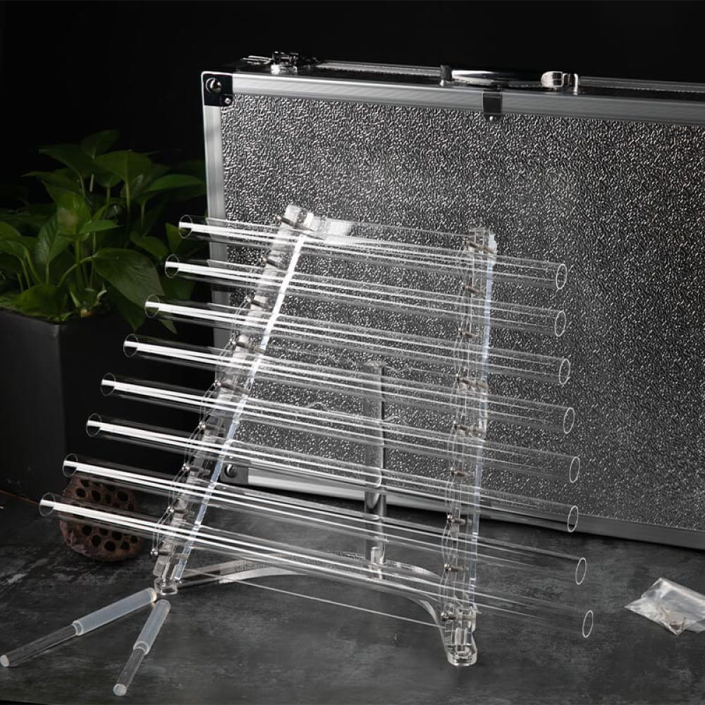 Clear glass test tubes in acrylic rack for Crystal Quartz Singing Harp therapy