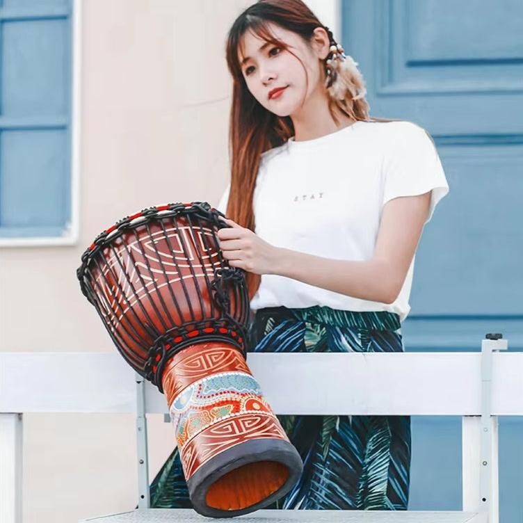 Decorative Djembe African Hand Drum with intricate geometric patterns for beginners