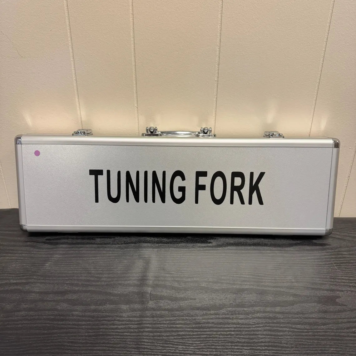 Silver metal case with TUNING FORK text for Giant Tuning Forks product
