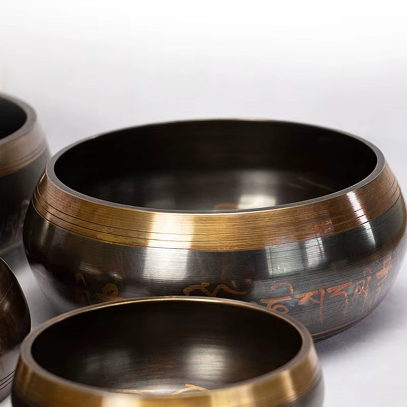 Handmade Tibetan Singing Bowl with metallic finish and brass banding for meditation therapy