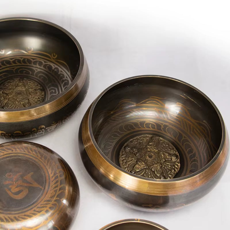 Handmade Tibetan Singing Bowl for Meditation Therapy with ornate etching and brass trim