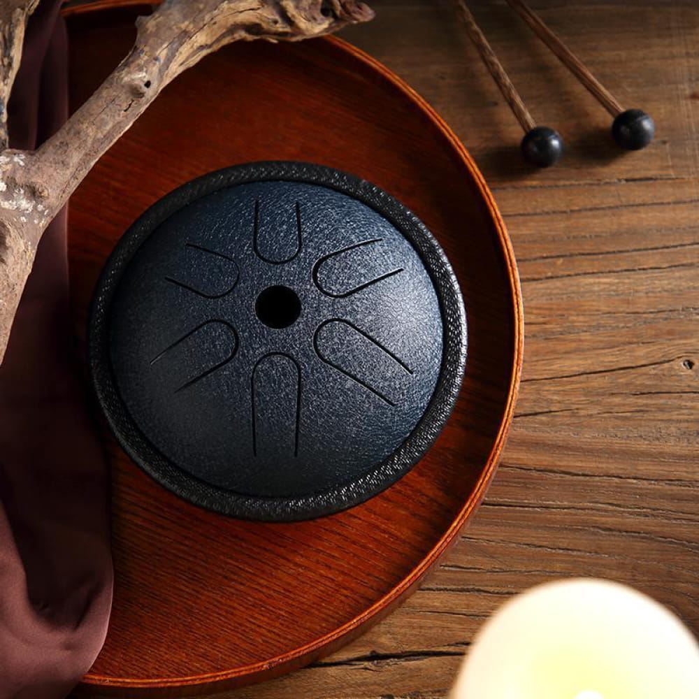 Black steel tongue drum with petal design in Mini Copper Disc Steel Tongue Drum C Key