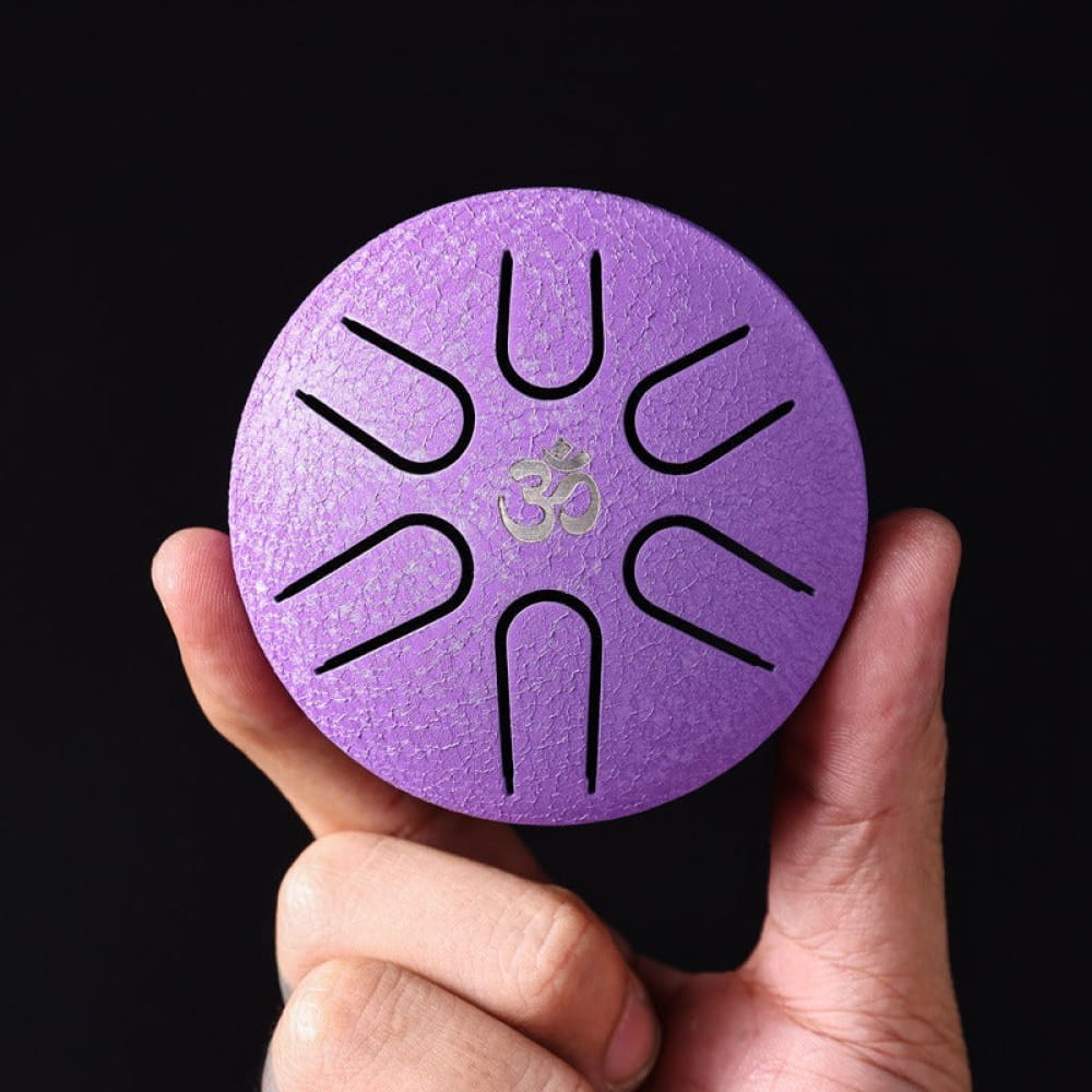 Purple metallic Mini Titanium Steel Tongue Drum with sunburst slits and 6 notes