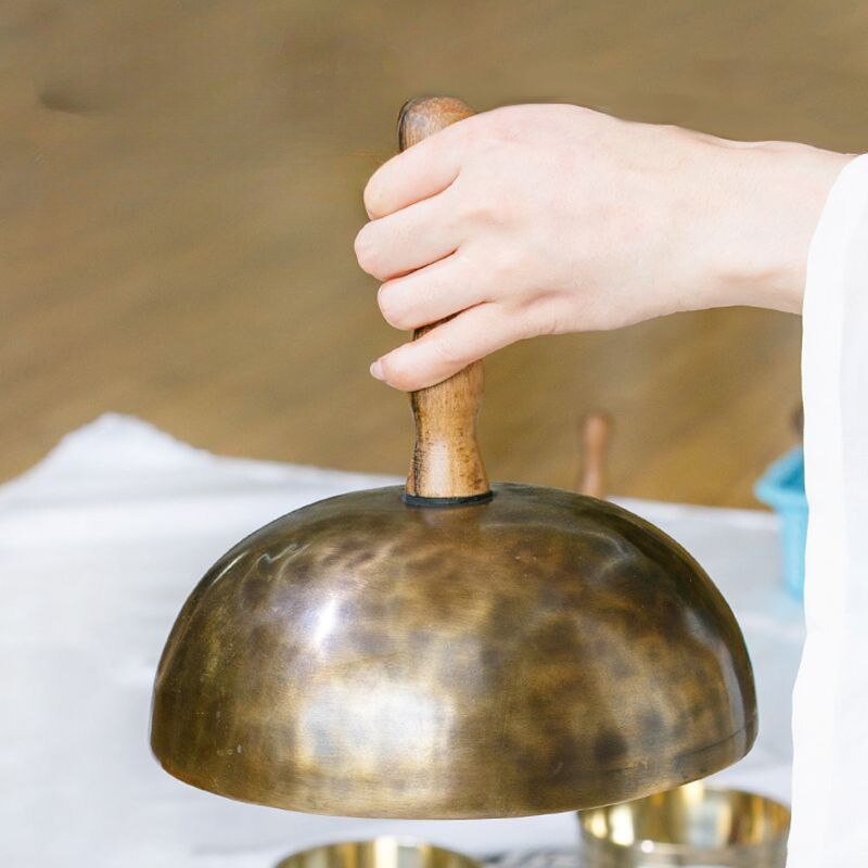 Bronze singing bowl with a wooden striker for Nepal Handmade Tibetan Meditation Bell Instrument