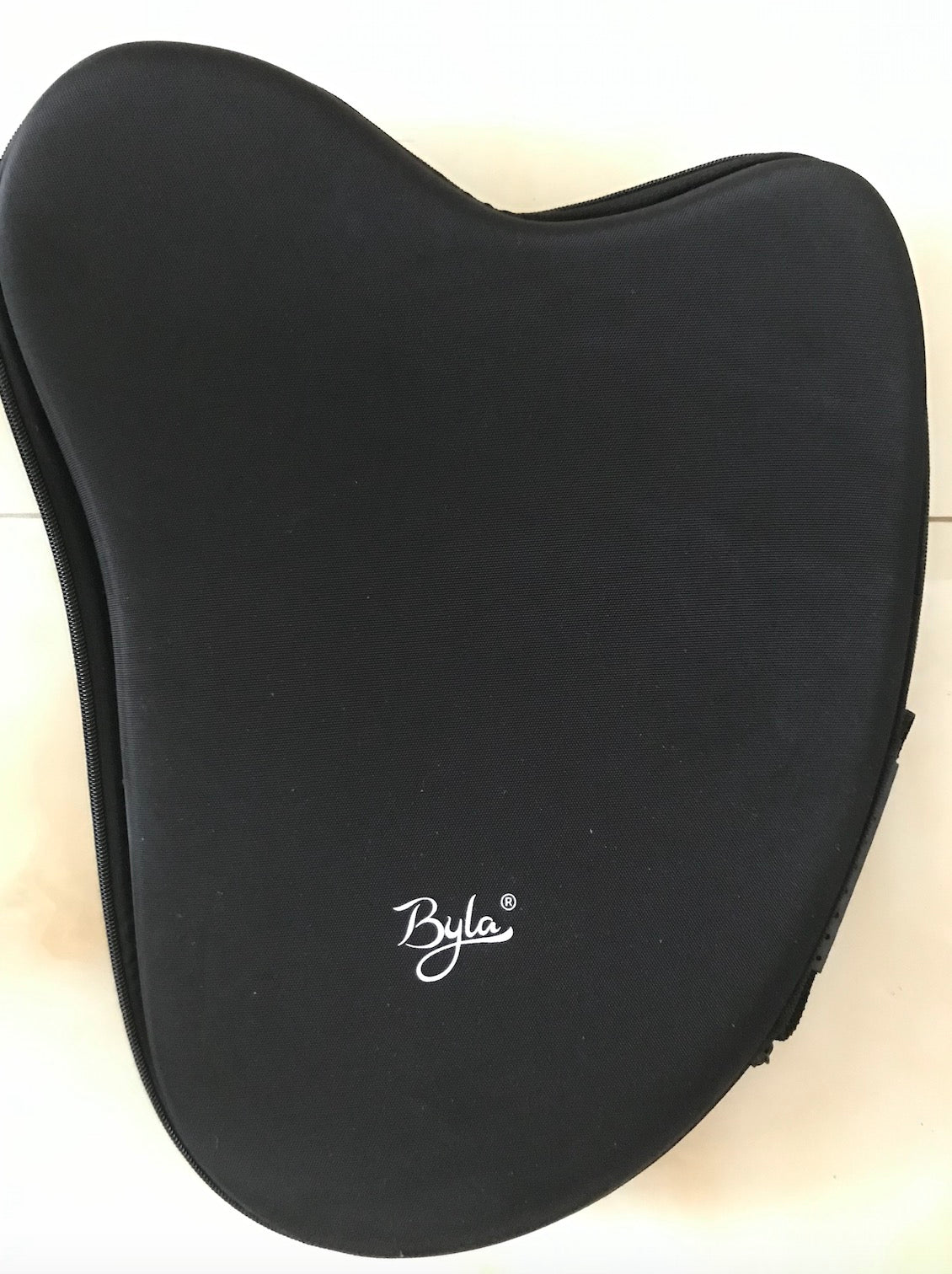 Black cushioned seat pad with Byka logo for Professional Reindeer Lyre Harp 21/27-String