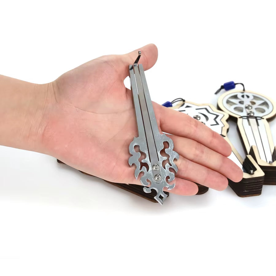 Decorative key-shaped bottle opener with ornate scrollwork in Stainless Steel Jews Harp