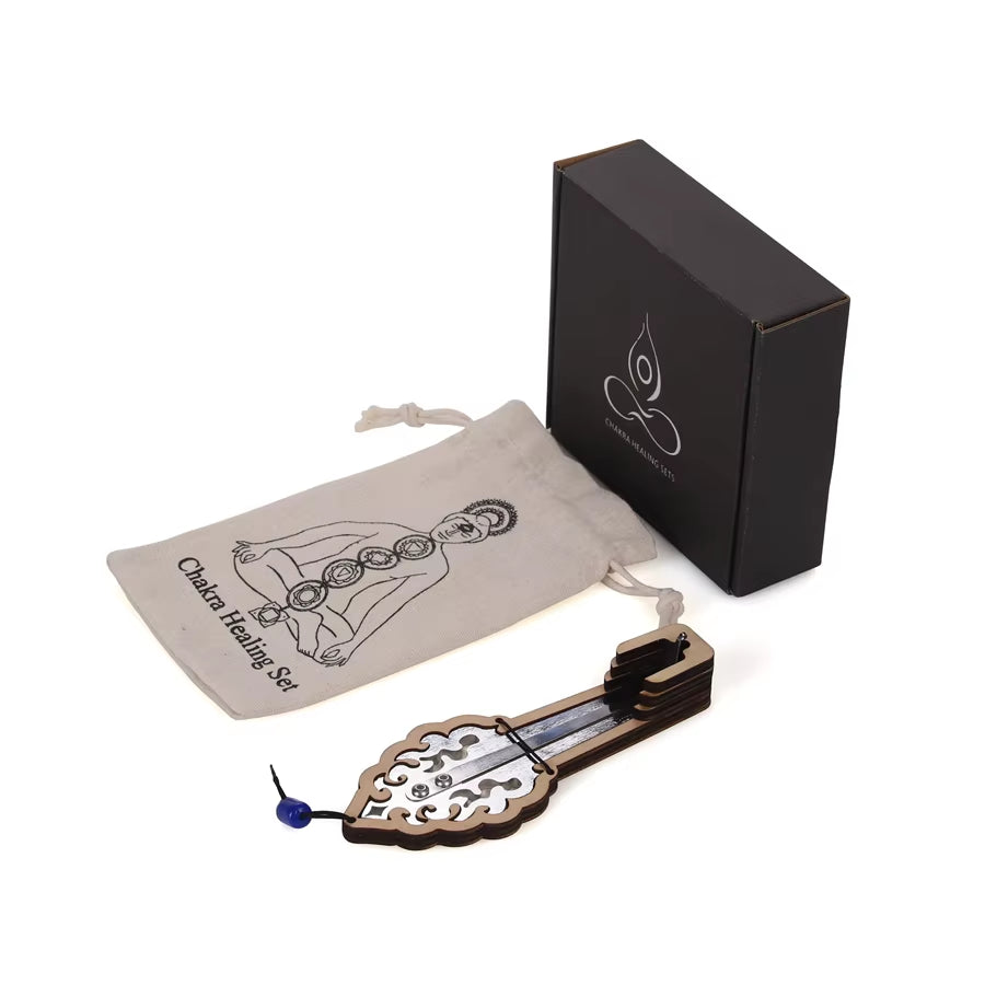 Decorative metal bottle opener with an ornate leaf design for Stainless Steel Jew’s Harp
