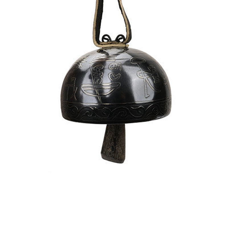 Black metal Tibetan Meditation Bell with decorative engravings for relaxation