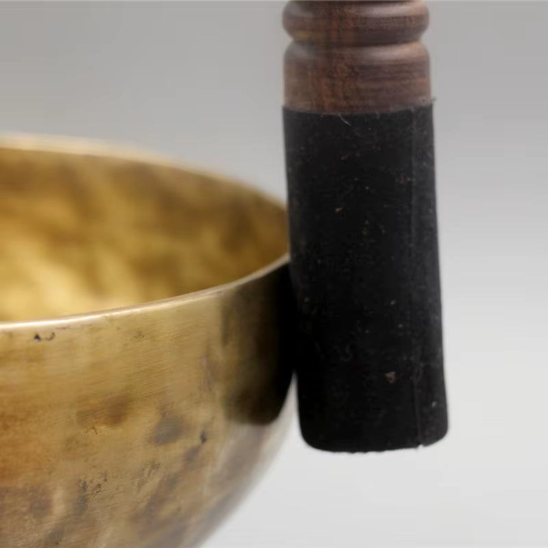 Brass Tibetan Singing Bowl with wooden mallet for meditation and healing